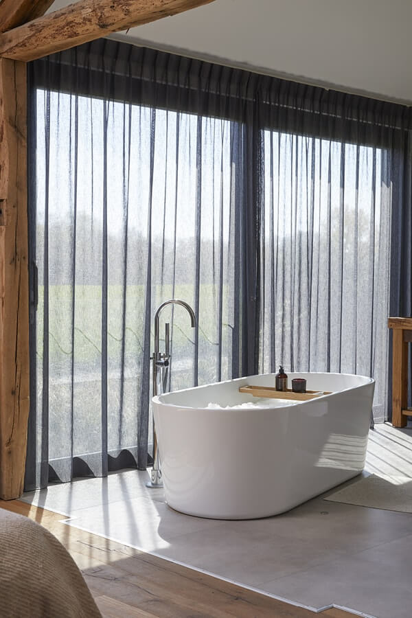 Vitrage voor een groot raam