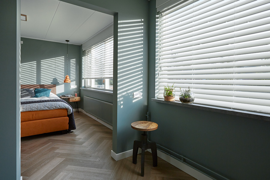 Slaapkamer design met witte shutters